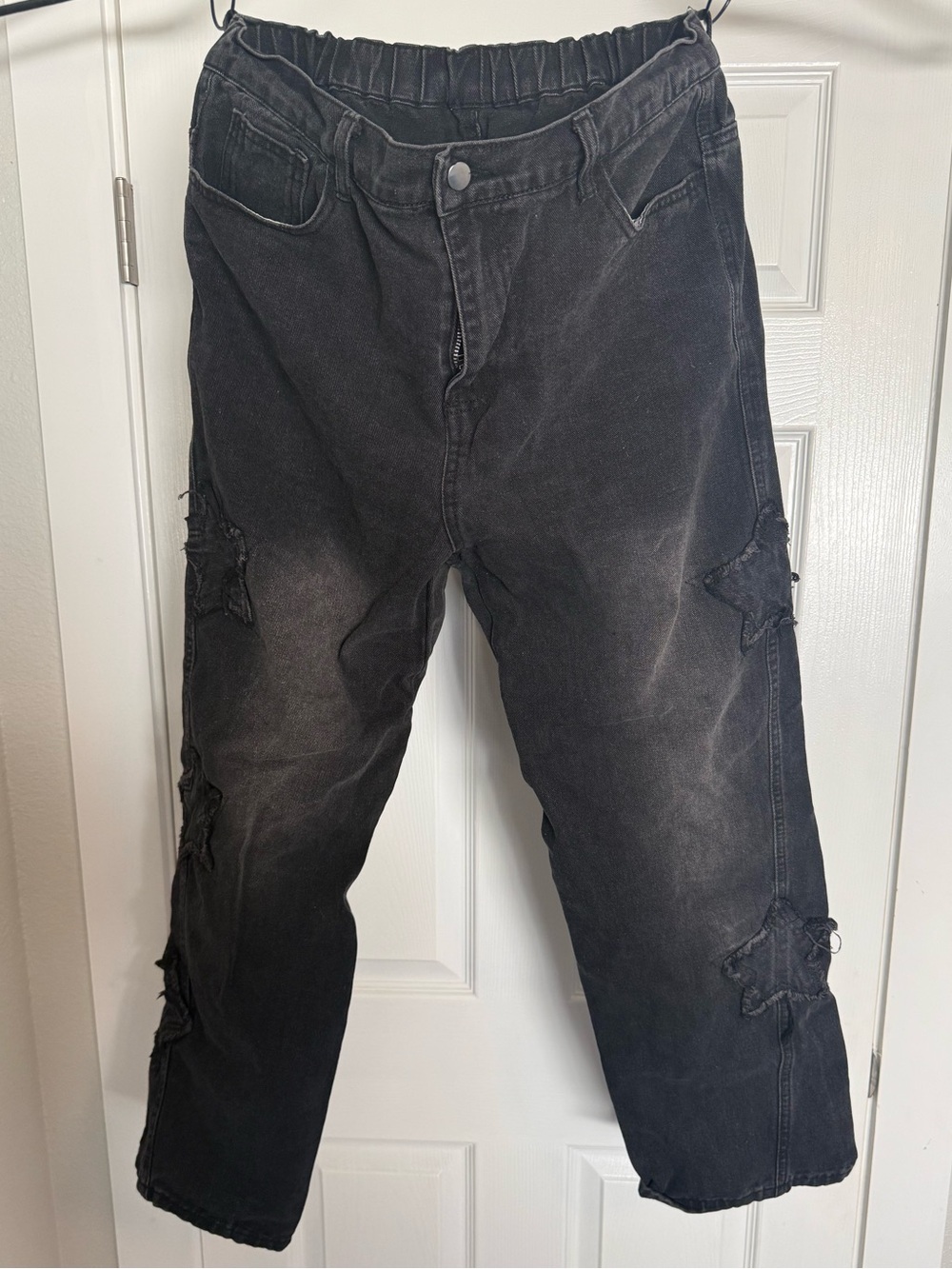 Women's Black Flare Jeans with Star Patch Details